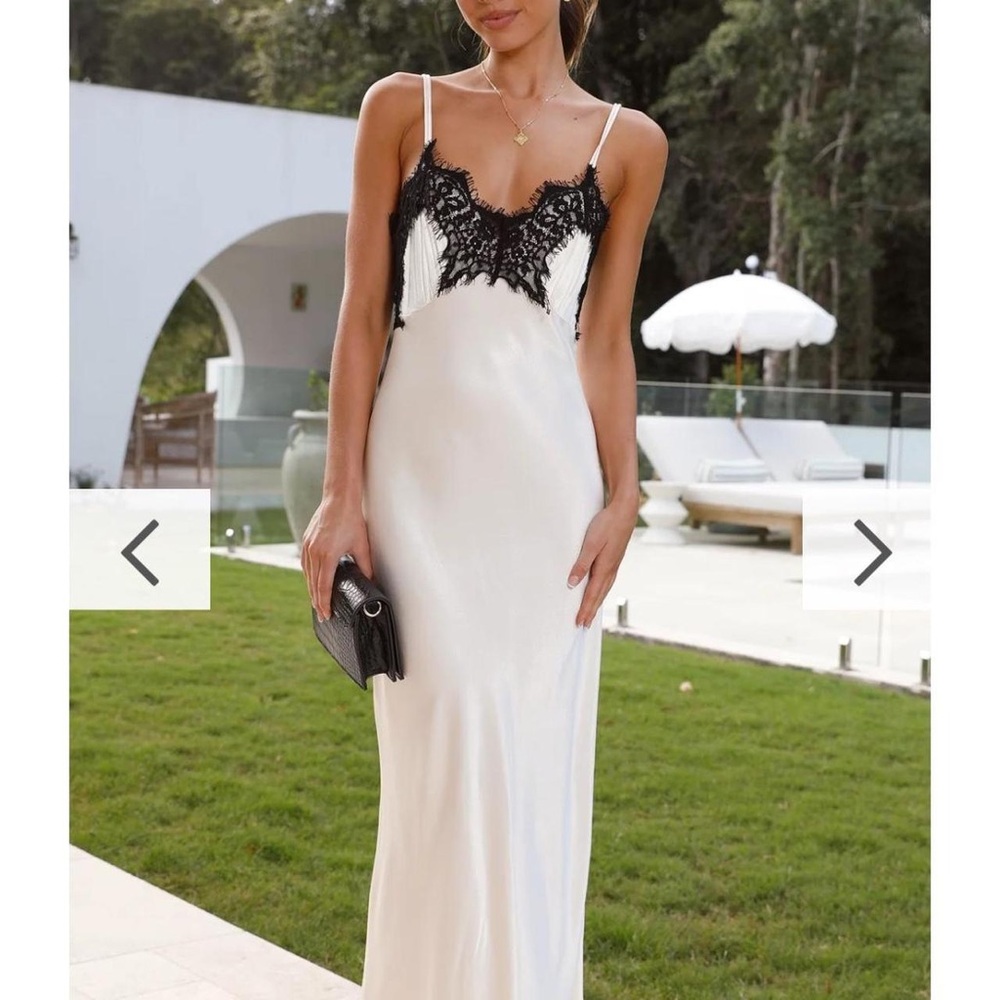 Elegant White Dress with Black Lace Detail
